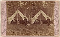 Group of beared men seated at campsite, tent in background by G W Baldwin