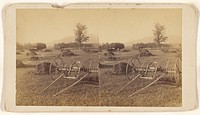 Hay in field with gathering machines
