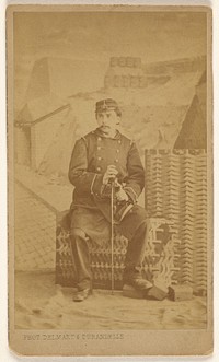 Unidentified soldier or actor as soldier, seated by Delmaet and Durandelle