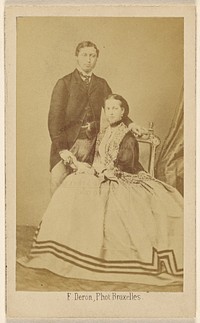 Unidentified couple: man standing and woman seated by F Deron