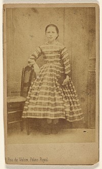 Unidentified woman, standing by L Laporte