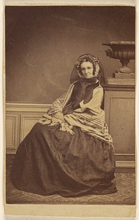 Unidentified woman wearing a bonnet and shawl, seated by Vuagnat