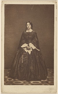 Unidentified woman, standing