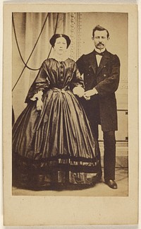 Unidentified couple: man with moustache and woman with her hair parted in the middle, both standing by Photographische Compagnie