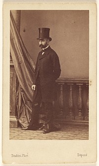 Unidentified bearded man wearing a top hat, standing by André Adolphe Eugène Disdéri