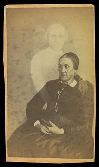 Unidentified elderly woman seated, three "spirits" in the background by William H Mumler