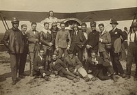 Group posed around the Caproni Ca. 3 airplane by Fédèle Azari