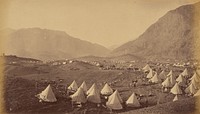 Tents in desert camp by John Burke