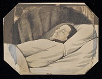 Man lying in bed, eyes closed