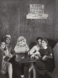 Two couples in a booth in a juke joint, Near Moorehaven, Florida by Marion Post Wolcott
