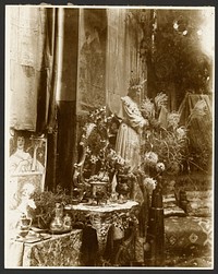 A Corner of Mucha's Studio with Statues, Prints and Flowers, Rue du Val-de-Grâce, Paris by Alphonse Maria Mucha