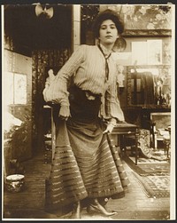 Female Model in Striped Blouse and Long Dress, Paris by Alphonse Maria Mucha