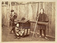 Woman in a palanquin with two carriers