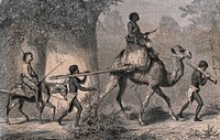 Slavery in the Sudan: people fastened at the neck to wooden clamps are being led away into slavery in Egypt. Wood engraving by Gauchard after K. Girardet.