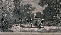 Two men are carrying a palanquin between them along a road, others walk behind with yokes across their shoulders. Wood engraving.