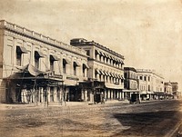A principal street in Calcutta. Photograph.