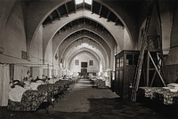Hospital de la Santa Cruz, Barcelona: a ward. Photograph, ca.1900.