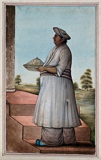 A butler carrying a serving dish. Gouache painting by an Indian artist.
