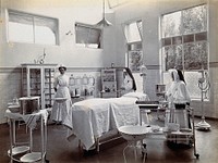 Johannesburg Hospital, South Africa: operating theatre with nun and nurse. Photograph, c. 1905.