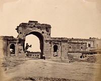 Lucknow, India: gateway of the Lucknow Residency, showing damage caused during the Indian Rebellion. Photograph by Felice Beato, ca. 1858.