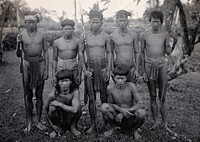 Sarawak: a group of Kalabit men. Photograph.
