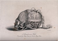 An elaborately decorated skull containing a watch and a chain. Etching.