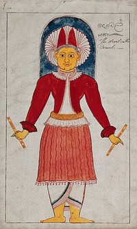 A Sinhalese devil called Dewel, wearing a headdress and carrying a stick in each hand. Gouache painting by a Sri Lankan artist.