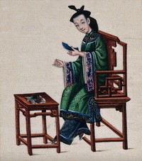 A Chinese lady busy at needlework. Painting by a Chinese artist, ca. 1850.