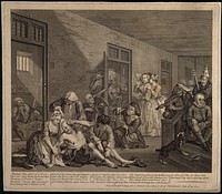 An insane man (Tom Rakewell) sits on the floor manically grasping at his head, his lover (Sarah Young) cries at the spectacle while two attendants attach chains to his legs; they are surrounded by other lunatics at Bethlem hospital, London. Engraving by W. Hogarth after himself, 1735.