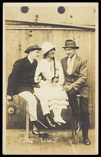 Sailors, one in drag, performing "The Rivals". Photographic postcard, 191-.