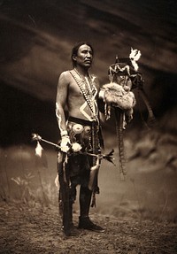 A Navajo man in ceremonial dress representing the Yebichai god Zahabolzi (Zahadolzha). Photograph by Edward S. Curtis, 1904.