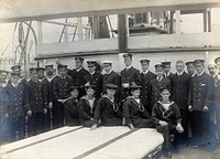 Sir Ernest Shackleton's officers and crew on the deck of the Nimrod: expedition to Antarctica, 1907. Photograph, 1907.