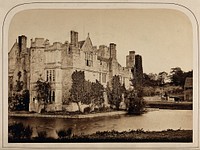 A house with a moat, Great Britain. Photograph, 1860/1890.