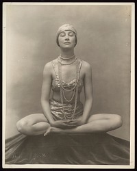 Marguerite Agniel seated in a Buddha position, circa 1929.