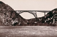 Blauw Krantz Bridge, South Africa: a ravine and railway bridge. Woodburytype, 1888, after a photograph by Robert Harris.