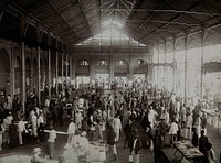 Maputo (formerly Lourenço Marques), Mozambique: the market building, interior, showing stalls and customers. Photograph, ca. 1900.