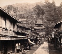 Nagasaki, Japan: Temple Street, with the cemetery on the hillside in the background. Photograph by Felice Beato, ca. 1868.