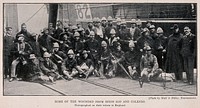 Boer War: a group of wounded war veterans at the docks in England. Halftone, c. 1900, after a photograph.