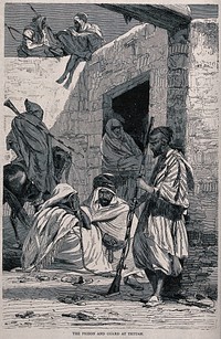 Prisoners at Tétouan restrained by chains seated in the presence of four guards armed with rifles. Wood engraving.