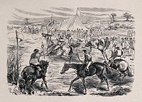 Jockeys on horseback at a racecourse watched by a crowd of people in a field with marquees. Process print.