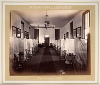 Philadelphia International Exposition, 1876: the Hospital of the Medical Department of the United States Army: a ward of empty beds. Photograph, 1876.