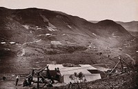 Transvaal, South Africa: a gold mining valley occupied by Union Company and Pioneer United Company, with Barberton in the distance. Woodburytype, 1888, after a photograph by Robert Harris.