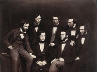 Residents at the Old Royal Infirmary, Edinburgh, summer 1854: clockwise from left, John Beddoe (seated left), John Kirk (back row), George Hogarth Pringle (back row), Patrick Heron Watson (back row), Alexander Struthers (seated right), David Christison (seated in front, right), Joseph Lister (seated in front, left). Photograph.