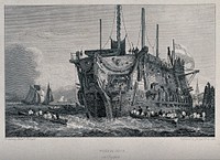 A prison ship in the River Thames at Deptford: rowing boats convey prisoners between land and the ship. Engraving by George Cooke after Samuel Prout.
