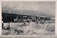 Boer War: a hospital train at the Battle of Colenso with soldiers milling around. Halftone, c. 1900, after H. Brazier-Creagh.