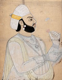 A raja holding a rose. Coloured ink drawing.