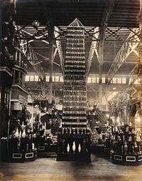 The 1904 World's Fair, St. Louis, Missouri: the Palace of Agriculture: a tower of olive oil bottles produced by Elwood Cooper. Photograph, 1904.