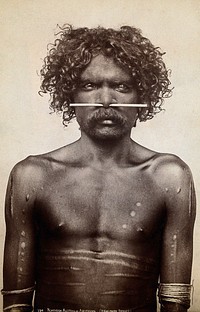 Australia: an aboriginal man (Ned Woolnah) with a bone through his nose. Photograph by Henry King, ca. 1890.
