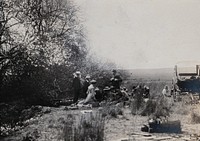 South Africa: members of the British Association eating a picnic lunch during their trek. Photograph by Dr. Tempest Anderson, 1905.