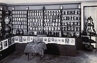 Part of the collection of pharmaceutical and medical antiques collected by Burkhard Reber and exhibited in Geneva in 1904. Photograph.